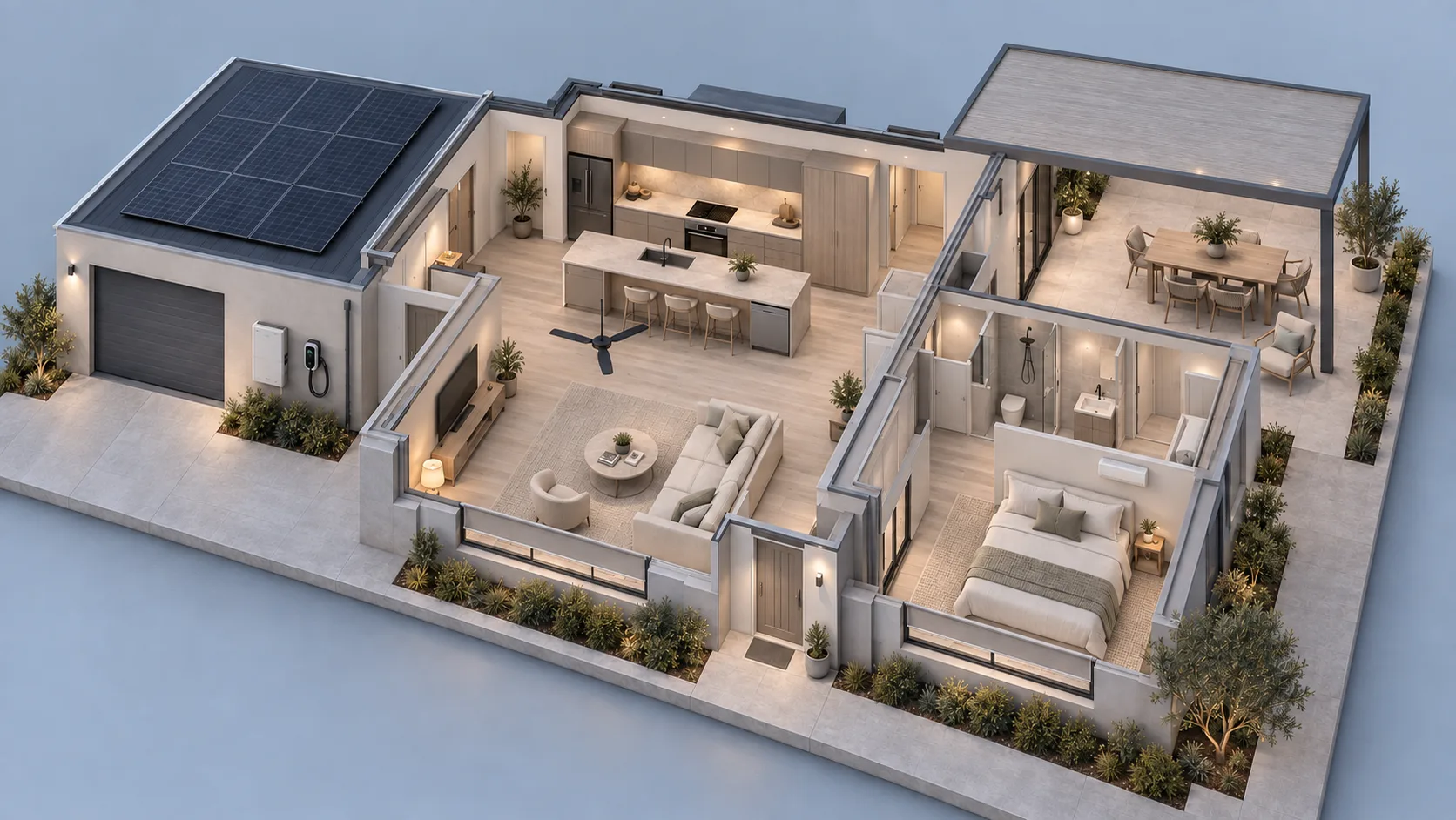 Open-plan kitchen and living room at dusk, downlights and a lamp on.